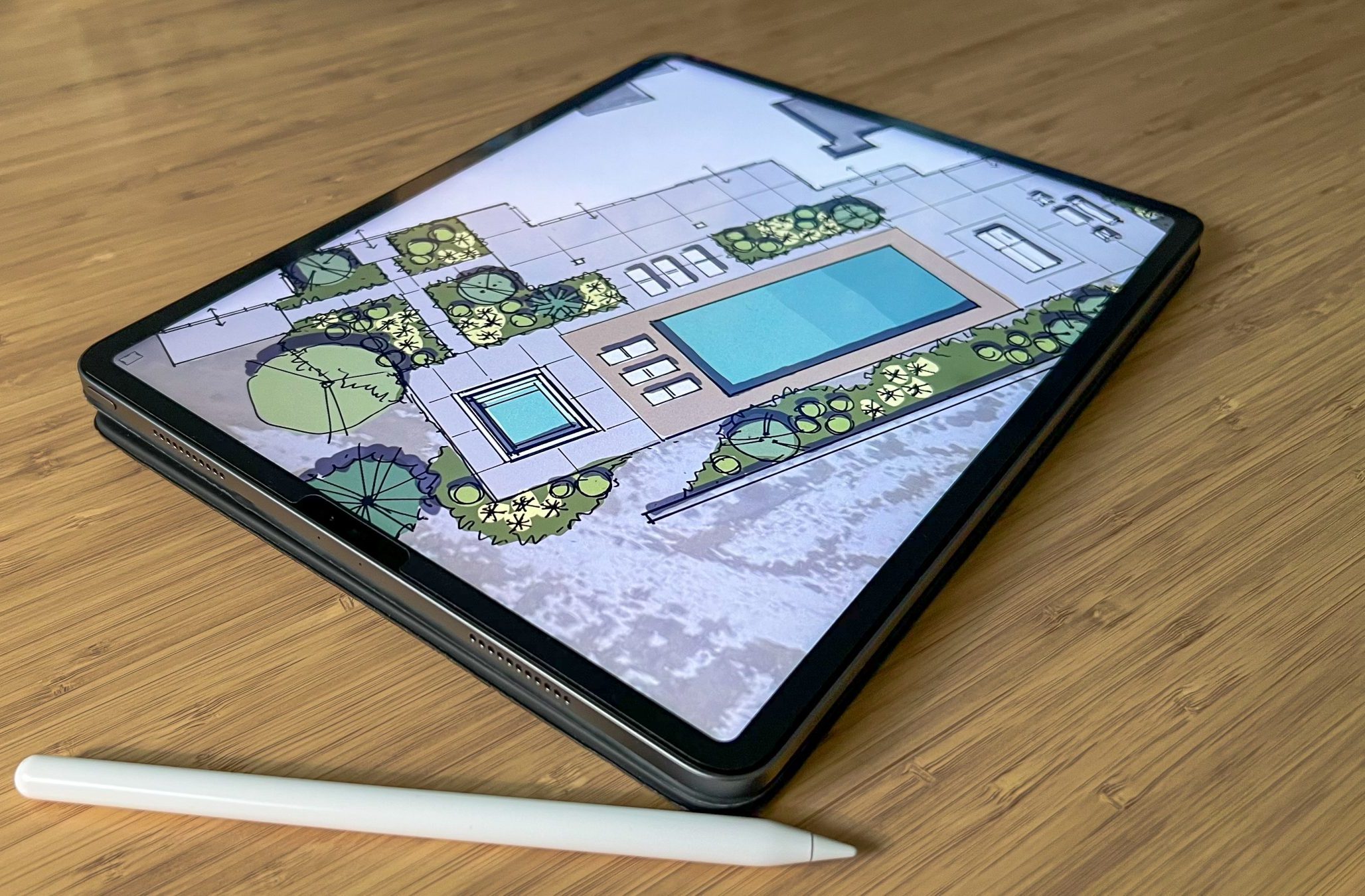 Tablet with landscape design and stylus.